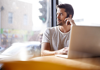 Image showing Thinking, phone call and man in cafe with laptop for networking, chat and creative professional on website. Computer, communication and freelancer with online job, cellphone or consulting for project