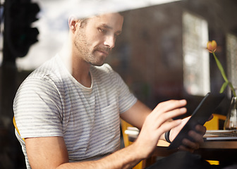 Image showing Man, tablet and coffee shop for networking, online communication and website for information. Male person, cafe and app for conversation, social media and remote work in restaurant for research