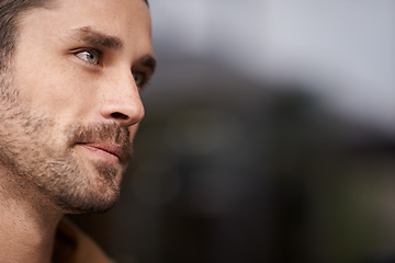 Image showing Outdoor, thinking and face of man with serious expression, confidence and adult pensive and wondering. Background, male person and guy with idea or plan in city of Madrid with mock up and space