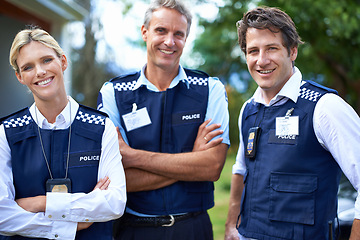 Image showing Crossed arms, security team and portrait of police people for crime, protection and safety service. Law enforcement, collaboration and men and woman officers for patrol, justice and surveillance