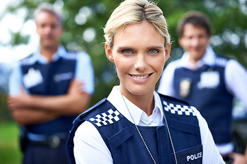 Image showing Security, law enforcement and portrait of police woman outdoors for crime, protection and safety service. Teamwork, collaboration and officer with confidence for patrol, justice and surveillance