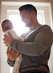 Image showing Father and baby, love and happy in a house with care, trust and child development, support or bonding. Family, security and dad with kid at home for learning, safety or morning games with gratitude