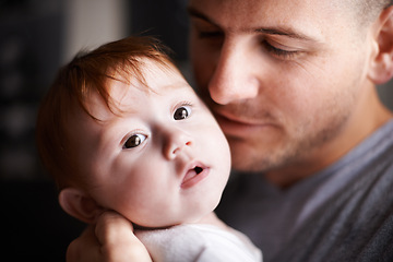 Image showing Closeup of father, baby and pride with hug for bonding, love and child development with parenting. Peace, calm and connection in childhood, man and newborn kid for affection or moment at family home