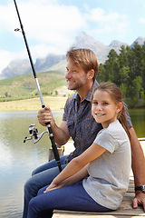 Image showing Father, child and fishing in nature for teaching, learning and outdoor with holiday, travel or sustainable living in portrait. Happy family, dad or fisherman with girl by water or lake for adventure