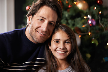 Image showing Christmas, family and portrait of father with girl in home for celebration, festival and season event. Face of happy dad and child bonding, relax and embrace for holiday, vacation and festive party