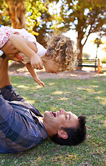 Image showing Plane, father and daughter with playing in park on grass for fun game, bonding and healthy relationship with energy. Happy family, man or girl child with airplane, childhood fantasy or flying outdoor