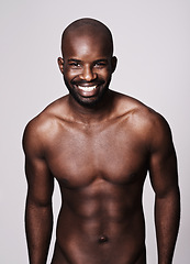 Image showing Black man, topless and body with abs in portrait, fitness and health with muscle on dark background. Exercise, sport and athlete with six pack, confident and masculine with testosterone in studio