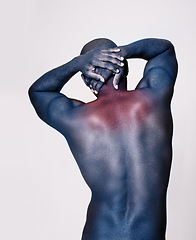 Image showing Man, back and neck pain with red glow, body and injury with muscle, tension or pressure on white background. Spine, bruise or strain with fitness, overlay for anatomy and burnout with ache in studio