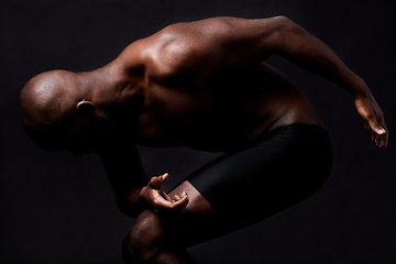 Image showing Black man, dancer and fitness with body muscle for fashion, style or art on a dark studio background. African male person, performer or bodybuilder in pose with muscular or masculine figure on mockup