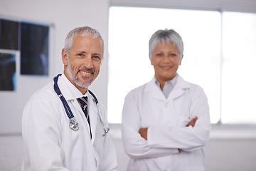 Image showing Teamwork, crossed arms and portrait of doctors in hospital for collaboration, insurance and support. Healthcare, clinic and confident man and woman smile for medical care, service and consulting