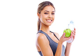 Image showing Fitness, woman and portrait with apple and water in studio for gym, wellness or diet on white background and mockup. Dietician or nutritionist with smile and fruit for vitamin and workout