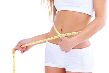 Image showing Woman, studio and waistline for measuring, health and wellness with diet and weight loss. Person, abdomen and commitment for training, goals and fitness with exercise or workout for proud body care