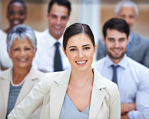 Image showing Portrait, woman leader and group of business people with support, confidence and solidarity at startup. Community, professional men and women together in office with happy teamwork, pride and trust