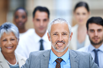 Image showing Portrait, leadership and group of business people with mature manager, confidence or solidarity at startup. Community, professional men and women together in office with teamwork, pride and happy CEO