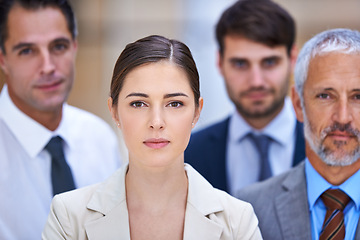 Image showing Portrait, leader and group of business people with woman boss, confidence and serious at startup. Community, professional men and women together in office with team, pride and face of female employee