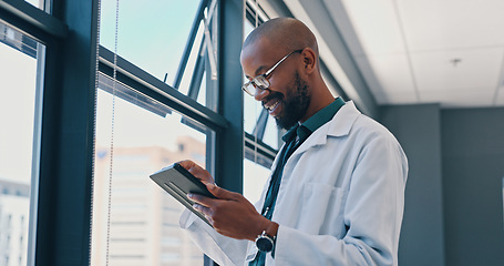 Image showing Man, doctor and tablet in hospital with smile for treatment results, telehealth or medical research. Healthcare, planning and digital technology for diagnosis, information or online consultation