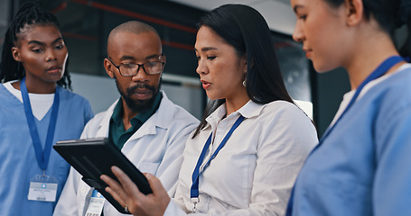 Image showing Medical team, tablet and meeting in hospital with doctor, discussion and diversity at work. Healthcare, nursing and health support staff with tech for patient info or test results and communication.