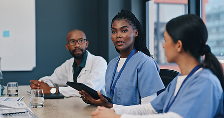 Image showing Healthcare, tablet and teamwork in meeting for talking, planning and research for collaboration in hospital. Medical, nurses and doctor with internet for communication, news report or feedback