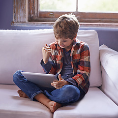 Image showing Boy, child and tablet for gaming with win, success with streaming and contest online, esports and celebrate. Pride, yes and fist pump with cheers, winner and digital world with gamer app at home