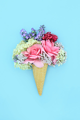 Image showing Surreal Summer Flowers in Ice Cream Cone Composition