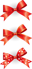 Image showing Ribbon, bow and creative decoration in studio for gift packaging, holiday season and christmas aesthetic. Art, template design and present knot on white background for party, celebration and wrapping