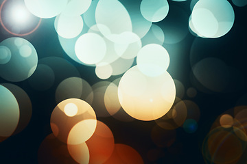 Image showing Bokeh, circle and wallpaper with lights for abstract pattern, design or texture of a background. Lens flare and space of color or lighting with blur texture, element or glitter effect in the night
