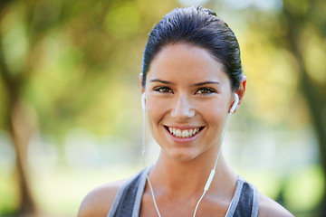 Image showing Nature, fitness and portrait of woman with headphones for cardio, training and exercise music. Athlete, smile and earphones with happiness for podcast streaming, audio and healthy body workout