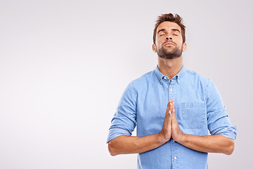 Image showing Man, praying and worship with religion for God, seek help and advice for guidance with hands together on white background. Spiritual, faith and gratitude with thanks, praise and forgiveness with hope