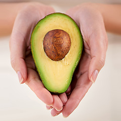 Image showing Hands, avocado and vegetable diet for wellness, health and minerals or antioxidants for nutrition. Closeup, person and holding vegan food for green detox, superfoods and omega 3 for organic skincare