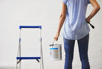 Image showing Paint, wall and woman in home with renovation creative project and planning for maintenance. Painting, house and back of person with roller tools for remodeling upgrade in mockup space and decision