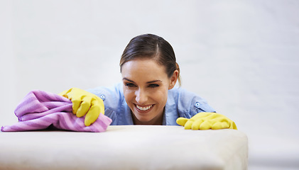 Image showing Woman, gloves and cleaning table or rag, disinfection and remove dirt or bacteria for maintenance. Female person, housekeeeping and wash with detergent or sanitation, home and chemical for germs