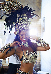 Image showing Dancer, samba and performance with celebration, smile and makeup for concert or party. Brazilian woman, festival and feather for culture, talent and creative artist for rio de janeiro carnival event