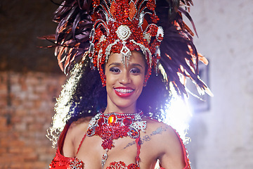 Image showing Portrait, costume and carnival for Brazilian female dancer, celebration and traditional festival. Dance, smile or samba for performance in Rio De Janeiro, headdress or concert for Mardi Gras