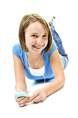 Image showing Teenage girl listening to music