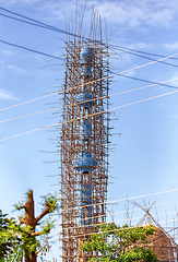 Image showing Repairing a mosque using Traditional bamboo scaffolding, Dembecha City, Amhara Region Ethiopia