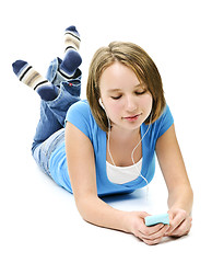 Image showing Teenage girl listening to music