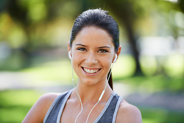 Image showing Park, fitness and portrait of woman with earphones for exercise, training and cardio music. Athlete person, smile and headphones with happiness for audio streaming, podcast and healthy body workout