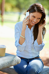 Image showing Happy, woman and phone call in a park for contact, conversation or communication outdoor. Smartphone, hello and female person relax in nature with web connection, chat or speaking while in a forest