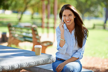 Image showing Park, phone call and woman with nature, relax and sunshine with contact and communication. Happy person, outdoor and girl with smartphone and summer with mobile user or digital app with weekend break