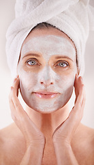 Image showing Spa, mask or woman in portrait for facial, skincare in studio with natural detox or cosmetics with towel. Model, confidence or face with lotion for anti aging treatment or beauty on white background