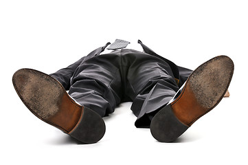 Image showing Businessman laying down on white background