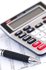 Image showing Tax calculator and pen