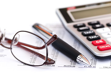 Image showing Tax calculator pen and glasses