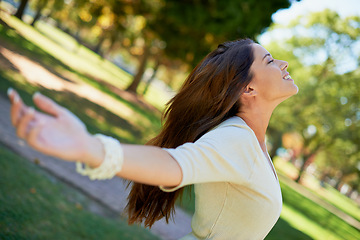 Image showing Woman, relax and peace with freedom in park on holiday or vacation in nature of forest or woods. Girl, stretching and breathing with zen energy from gratitude for trees, summer and environment