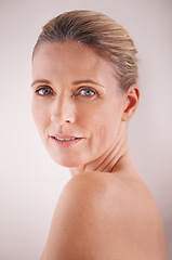 Image showing Woman, mature and studio with skincare, portrait and cosmetic with treatment. Model, beauty and luxury with body, cosmetics and care for anti ageing and healthy skin with wellness and confidence