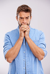 Image showing Anxiety, stress and nervous man in studio for results, outcome or suspense gesture on white background. Overwhelmed, worry and male model with panic expression, overthinking or waiting for answer