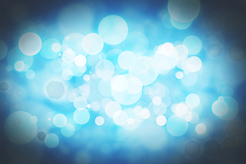 Image showing Abstract, graphic and blue bokeh with light, Christmas theme, decor and creativity with color. Wallpaper, effects and sparkle or shine with pattern, circle and creative design for screensaver