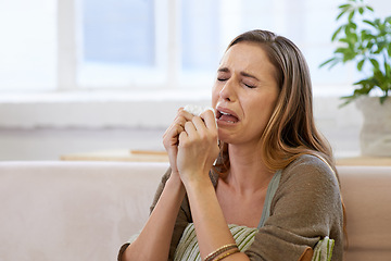 Image showing Woman, crying and emotional distress in home with mental health, depression or broken heart. Female person, tissue and tears in apartment or psychology grief or suffering for worry, loneliness or sad