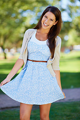 Image showing Portrait, girl or playful in spring, fashion or couture as stylish, casual or fresh outfit to relax. Happy, woman or proud of trendy, designer or boutique clothing on sunny day in park for leisure