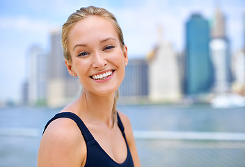 Image showing Woman, workout and portrait by river in city for morning routine, wellness and exercise for active cardio. Female person, happy and fitness runner or athlete for sports hobby or training in New York.